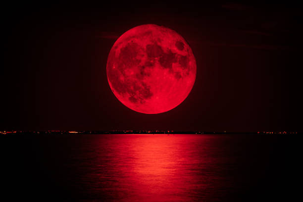 blood moon's reflection on sea