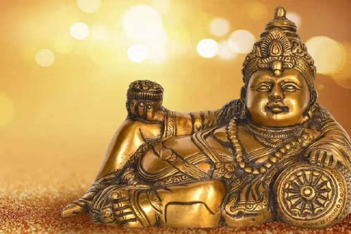 Devotee worshipping Kuber Dev with diya, flowers, and coins to attract wealth, prosperity, and financial success in life